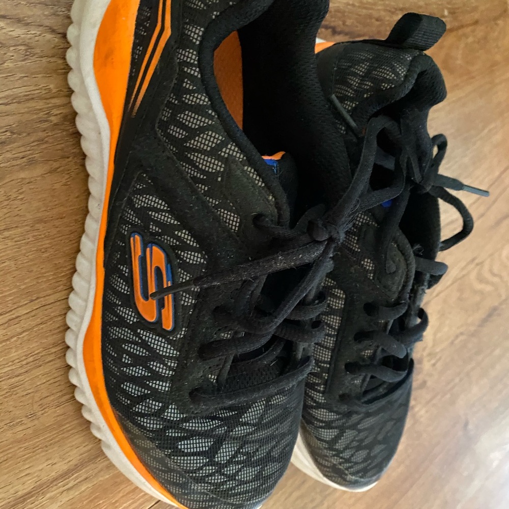 Boys Skechers black and orange size 2